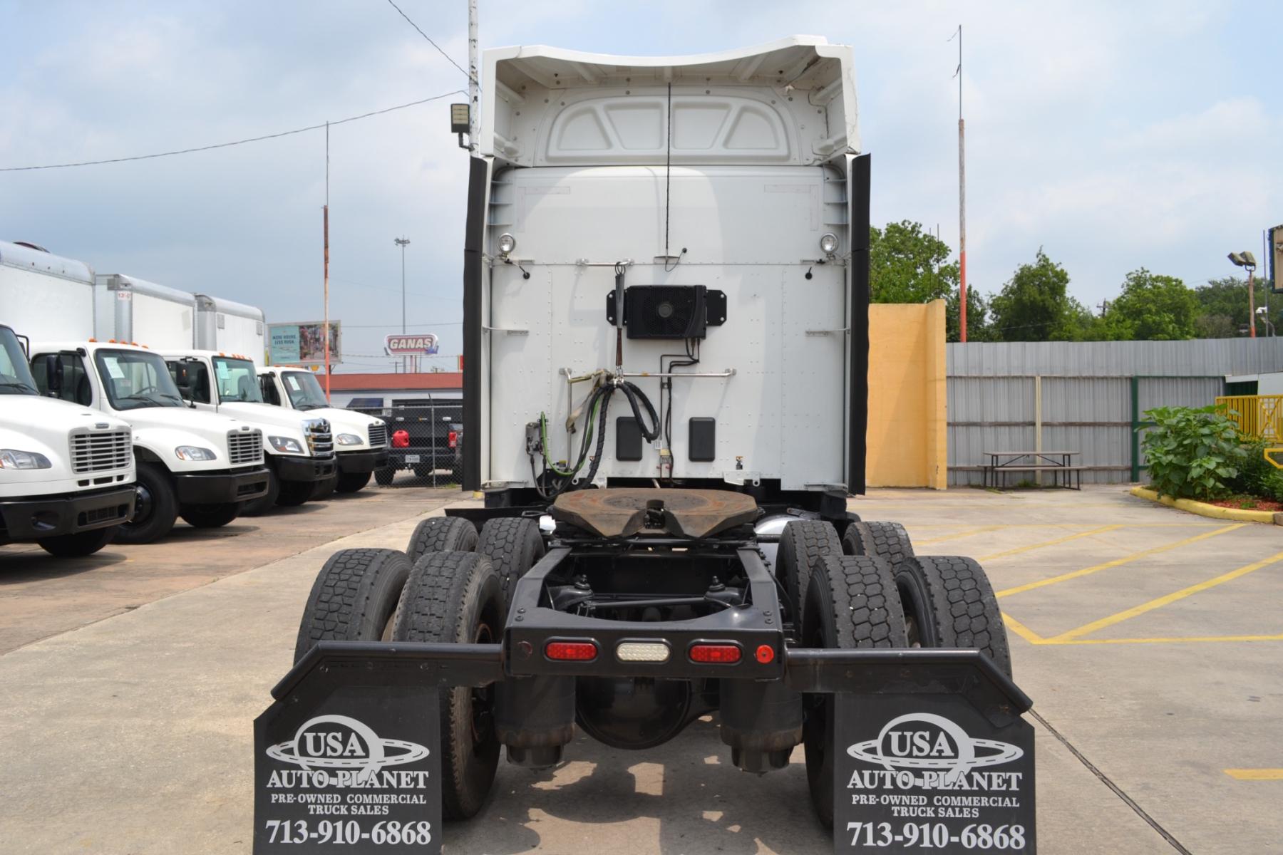 2017 WHITE /BLACK PETERBILT 579 EPIQ with an PACCAR MX13 12.9L 455HP engine, E.FULLER ADVANTAGE 10SPD AUTOMATED transmission, located at 9172 North Fwy, Houston, TX, 77037, (713) 910-6868, 29.887470, -95.411903 - 65" MID ROOF SLEEPER, DOUBLE BUNK, AIR SLIDE 5TH WHEEL, DIFF LOCK, AIR RIDE, ENGINE BRAKE, ELECTRIC APU, BUILT-IN NAVIGATION, MINI FRIDGE, ALUMINUM WHEELS, POWER WINDOWS , LOCKS, & MIRRORS, DUAL 135 GALLON FUEL TANKS, WB:230", RATIO: 2.64 - Photo #5